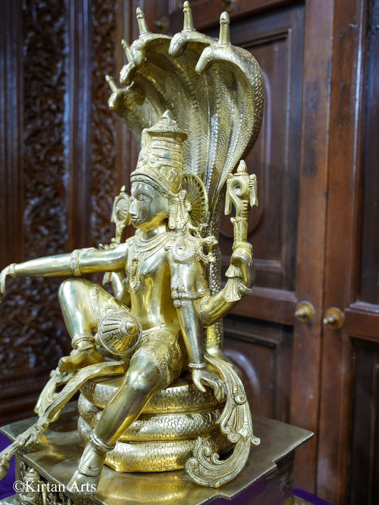 Brass Lord Vishnu seated on SeshNag 28"