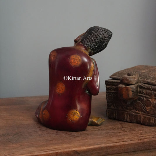 Modern Resting Buddha Statue in Maroon and Gold 10"
