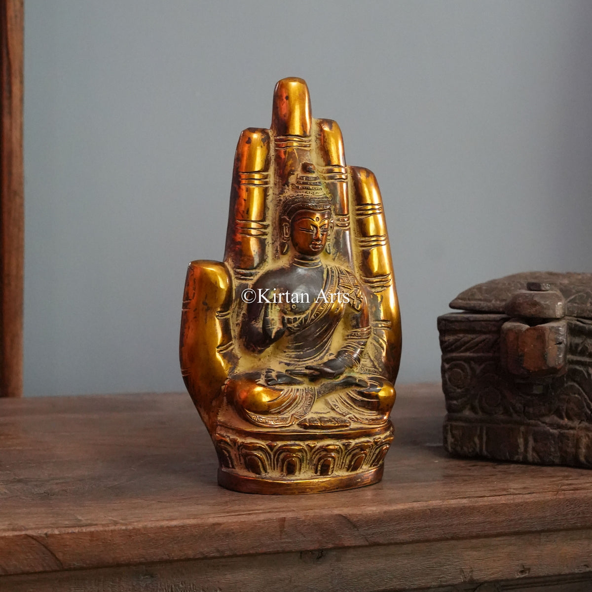 Brass Buddha Seated Within an Open Palm Sculpture 9.5"