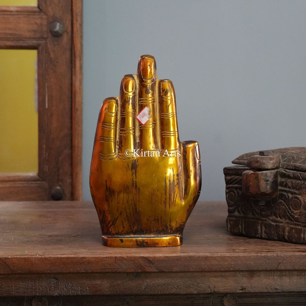 Brass Buddha Seated Within an Open Palm Sculpture 9.5"